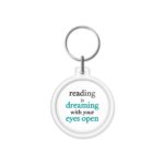 porta-chaves "reading is dreaming with your eyes open"
